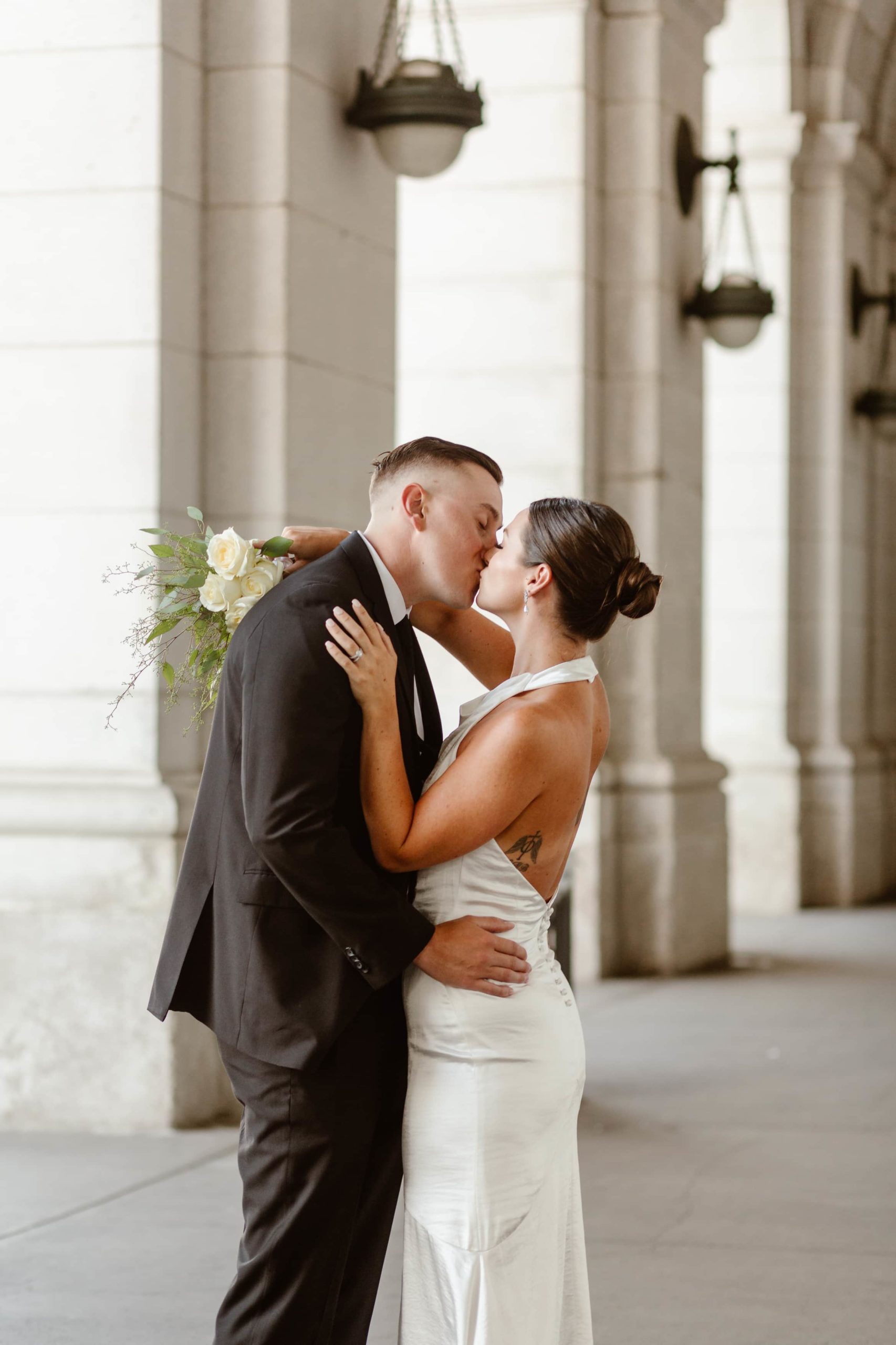 Wedding couple kiss at Union Station in DC