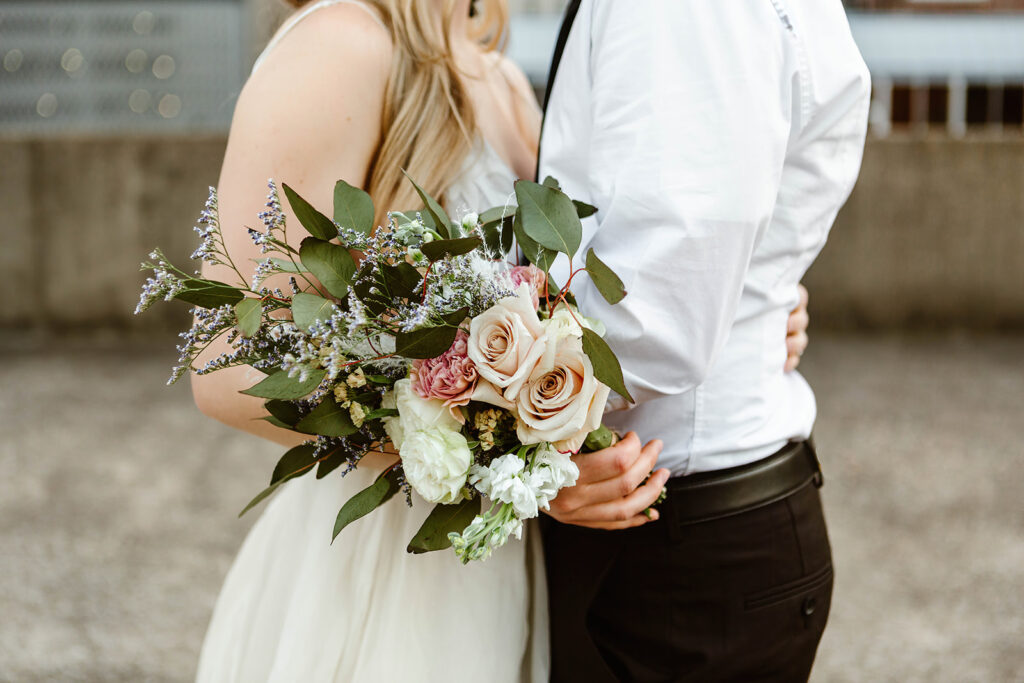 tips for choosing an elopement photographer, elopement photography, bridal bouquet during their elopement, romantic elopement photos