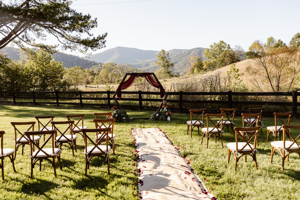 micro wedding ceremony set up in the backyard of a VRBO with stunning mountain views