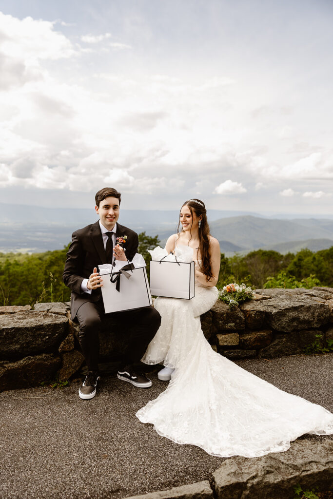 bride and groom exchanging gifts with each other during their shenandoah elopement