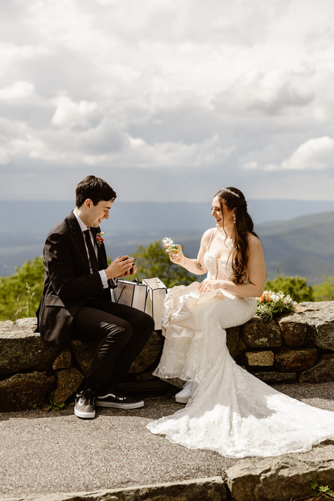 bride and groom exchanging gifts with each other during their shenandoah elopement