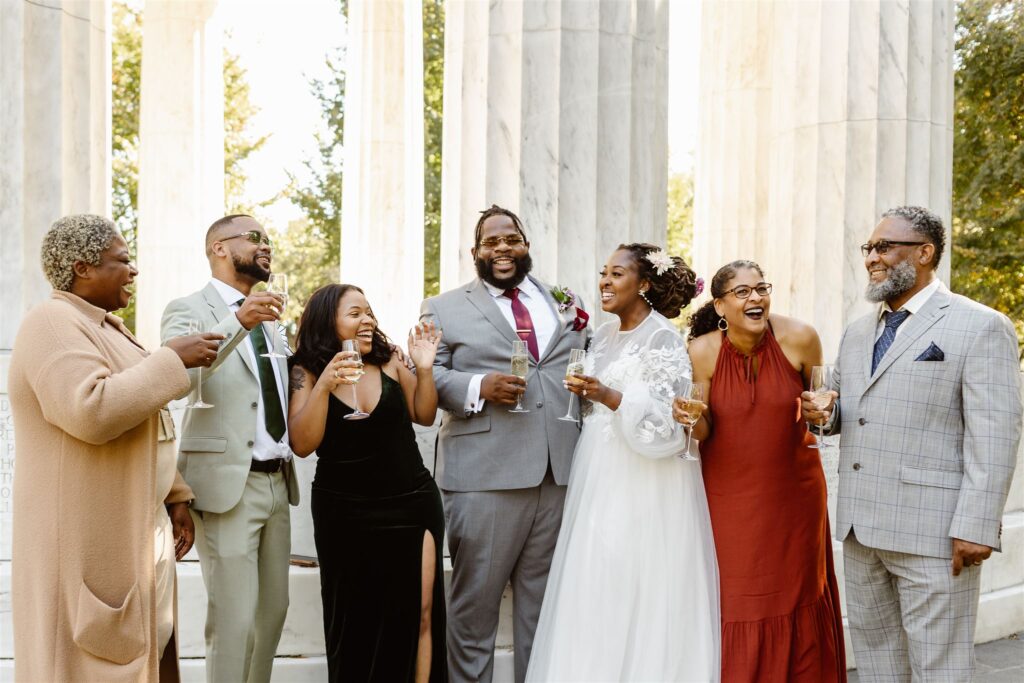 wedding photos with family and champagne in Washington DC