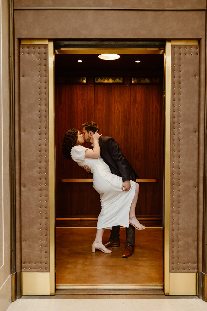 romantic DC engagement photo as they kiss in the elevator