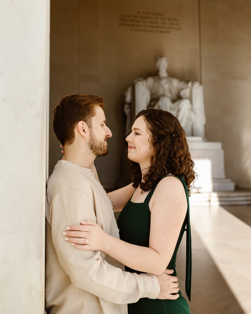 Couple at the Lincoln Memorial for their spring engagement photos in Washington DC.