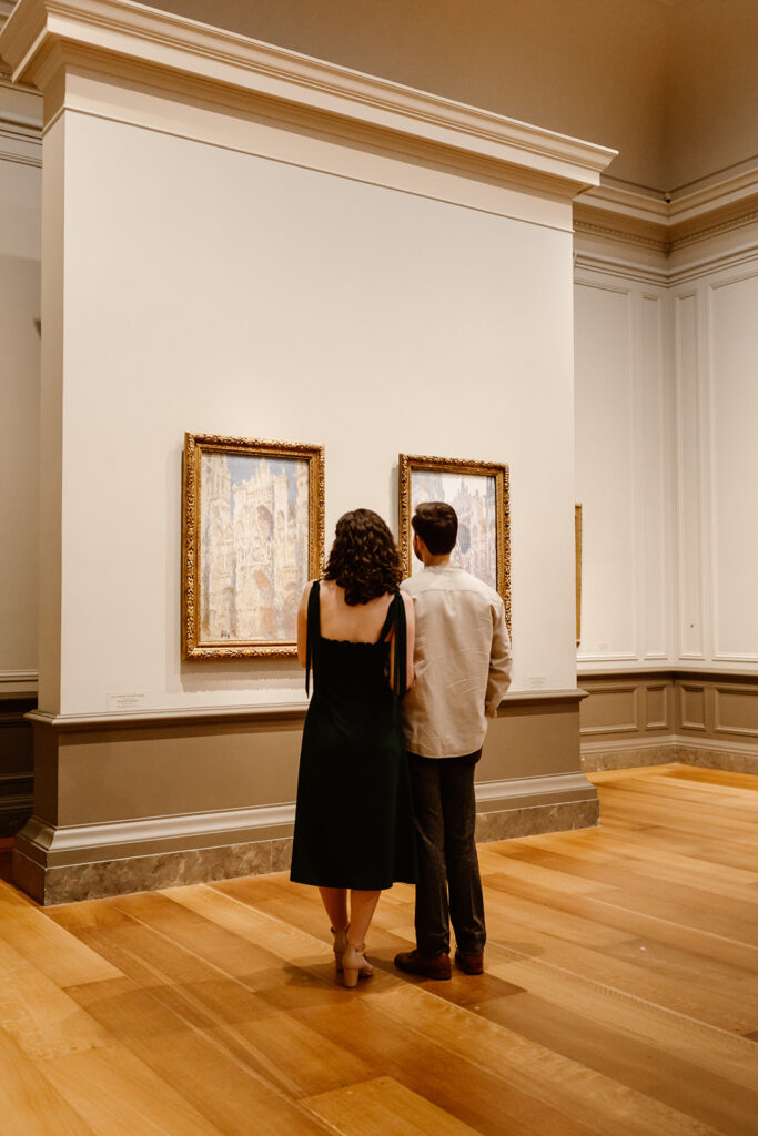 The couple strolled through the National Gallery of Art during their engagement session
