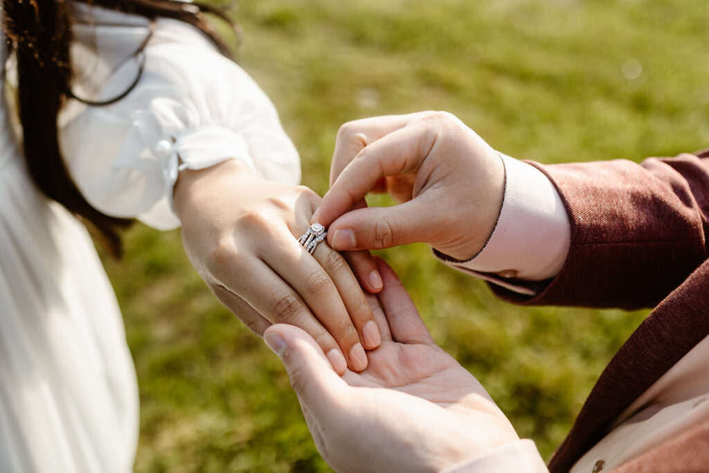 bride and groom exchanging rings during their shenandoah national park elopement ceremony