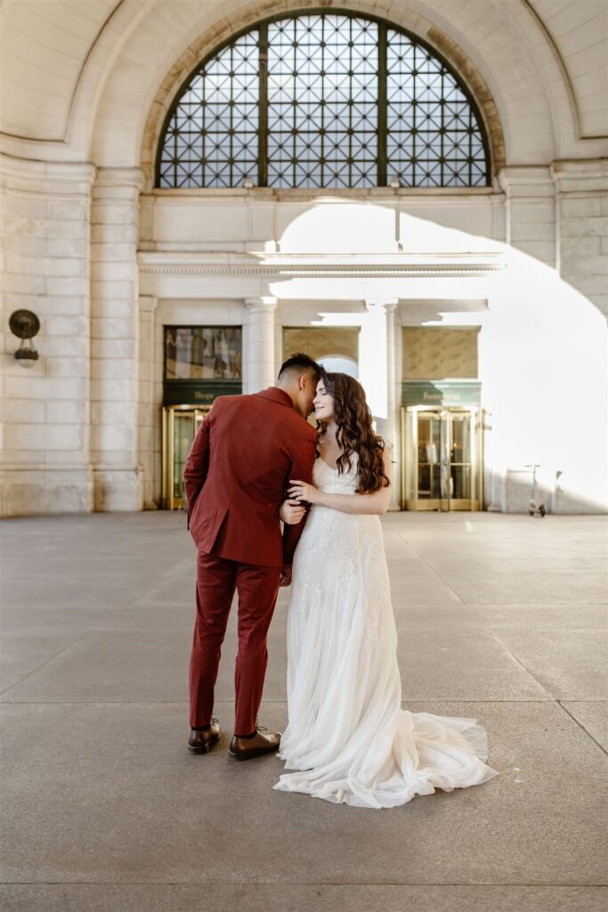 the bride and groom posing for their elopement photos in Washington DC