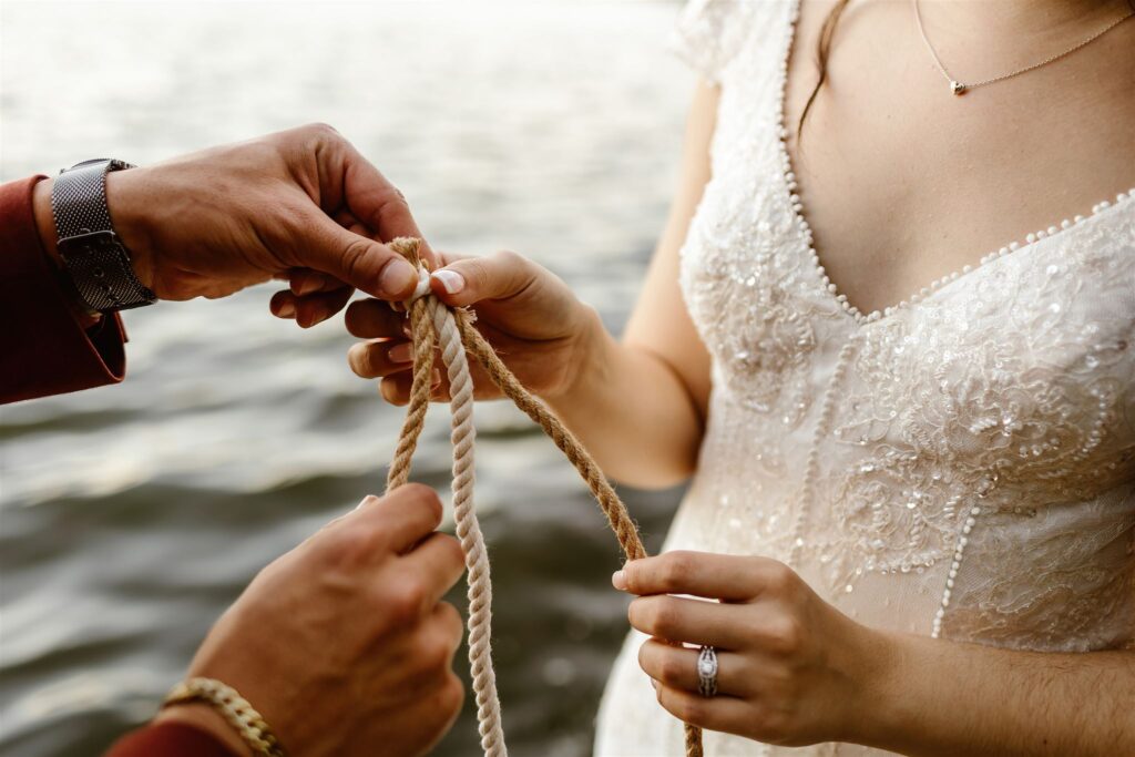 the bride and groom tying their cords for their elopement in Washington DC