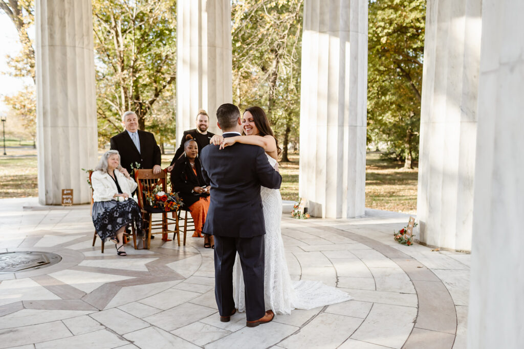 the wedding couple's first dance at the dc war memorial for their elopement wedding