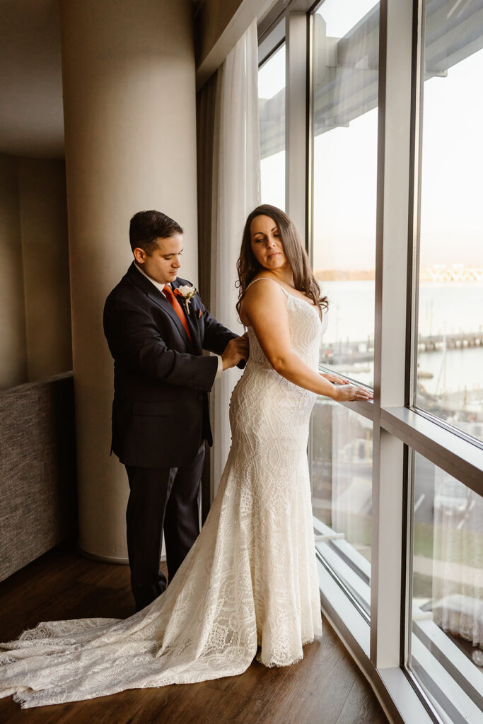 the bride and groom getting ready together during their Washington DC elopement