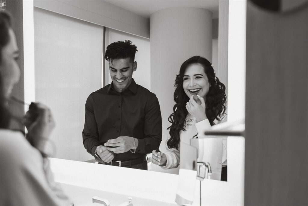 the wedding couple getting ready together during their Washington DC Elopement