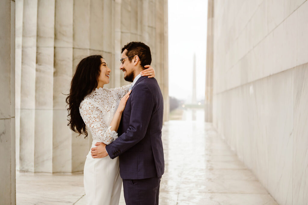 the wedding couple together at the Lincoln Memorial for elopement photos