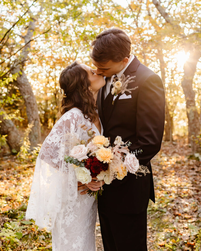 the wedding couple kissing during their adventure elopement in Virginia