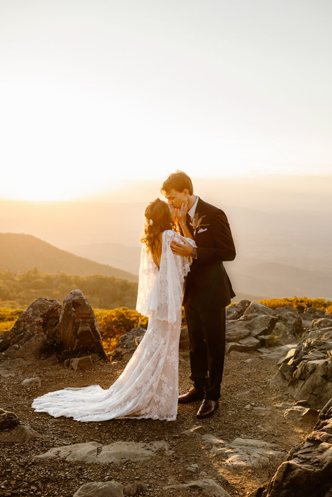 the bride and groom kissing during their Shenandoah National Park elopement ceremony on the mountain