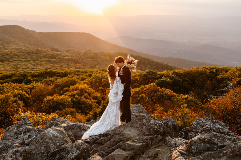 bride and groom on the mountain for elopement photos in Shenandoah National Park