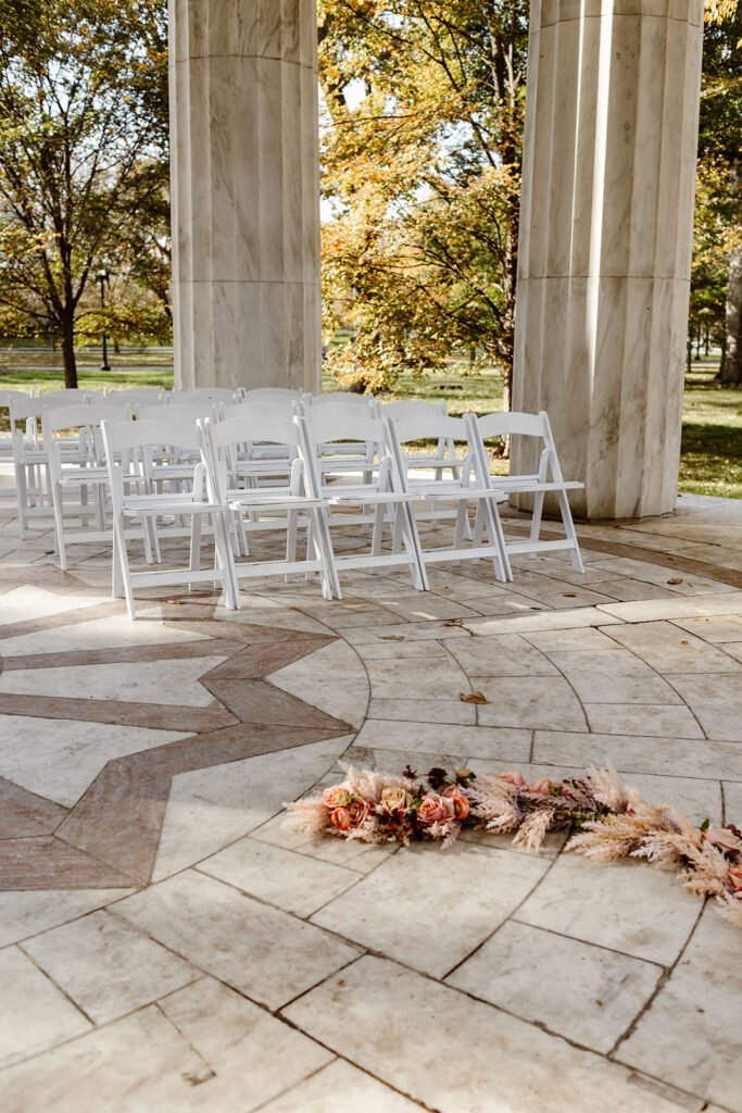 the wedding chairs set up for the DC War Memorial wedding ceremony