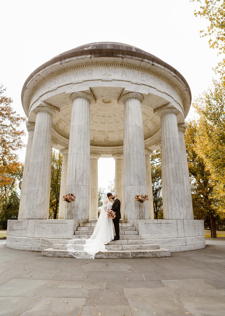 the wedding couple at the DC War Memorial 