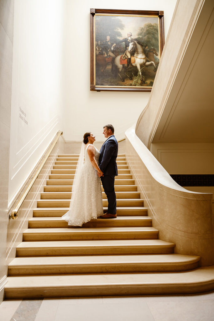 wedding couple exploring the national gallery of art in dc