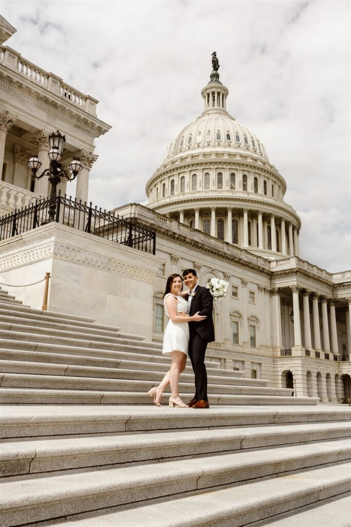 wedding couple exploring the monuments during their washington dc courthouse elopement day