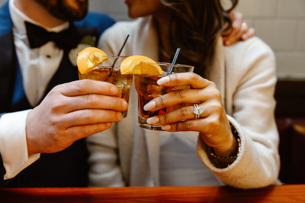 bride and groom having cocktails