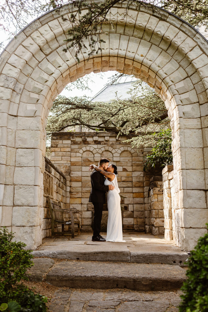 the elopement couple in the gardens of the National Cathedral in Washington DC