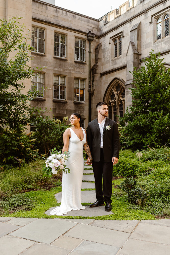 wedding couple posing in the courtyard in Washington DC