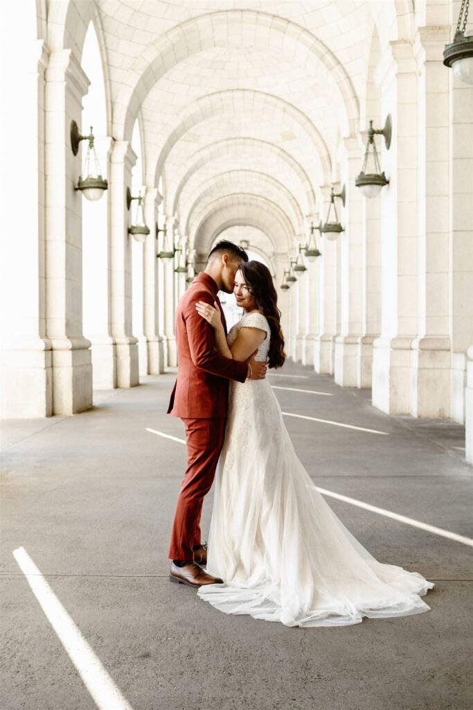 the wedding couple at the Union Station in Washington DC during their destination elopement