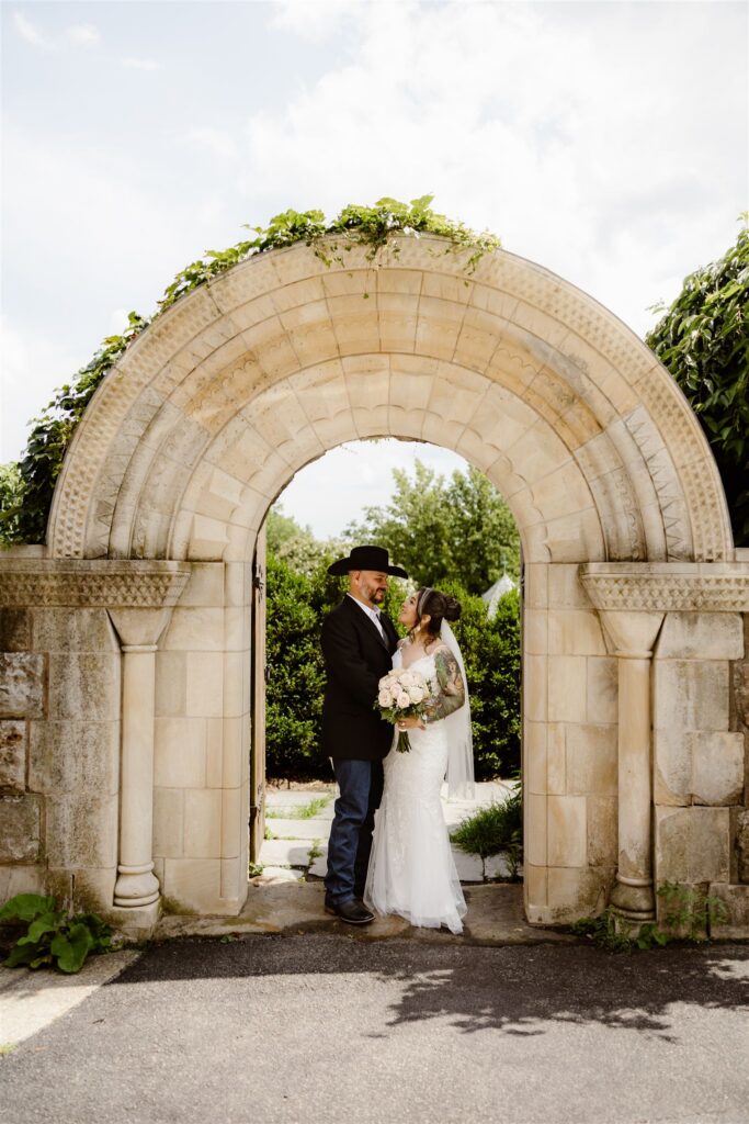wedding couple posing in the courtyard in Washington DC