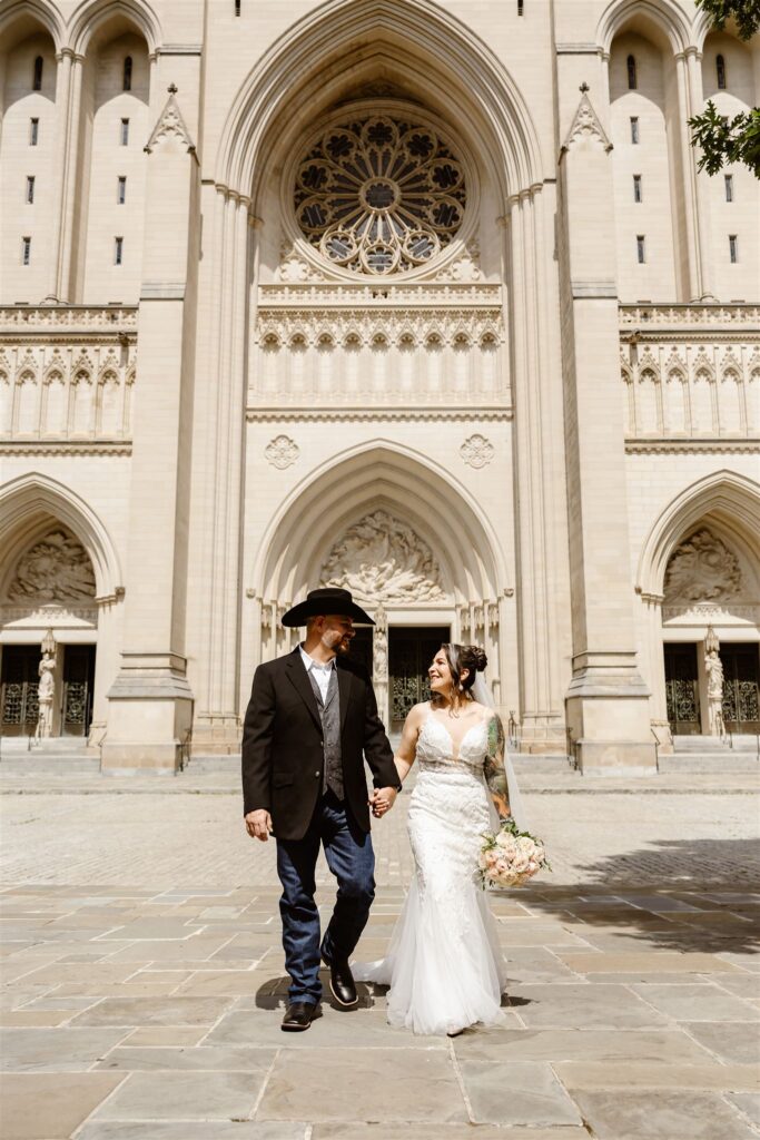 wedding couple posing in front of the National Cathedral in Washington DC