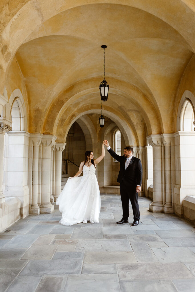 the elopement couple dancing at the National Cathedral