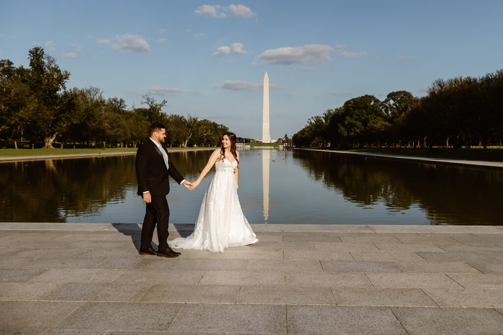 the wedding couple at the Reflecting Pool in Washington DC