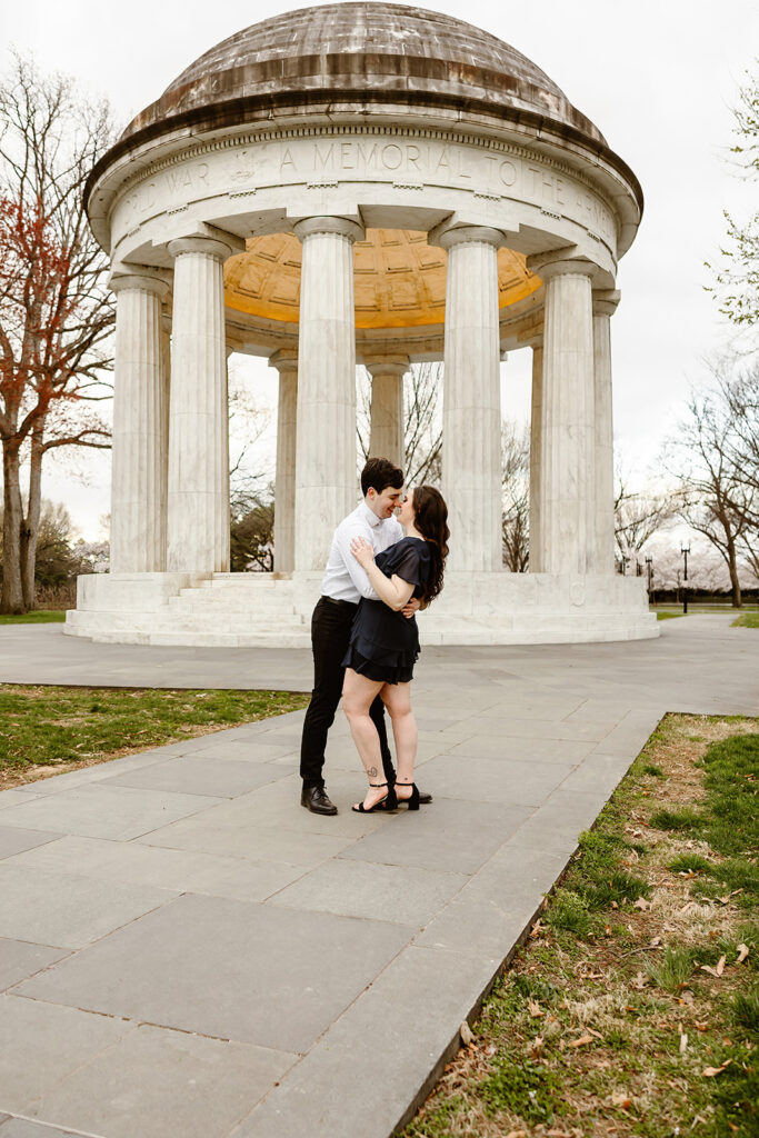 the engaged couple at the DC War Memorial for spring engagement photos