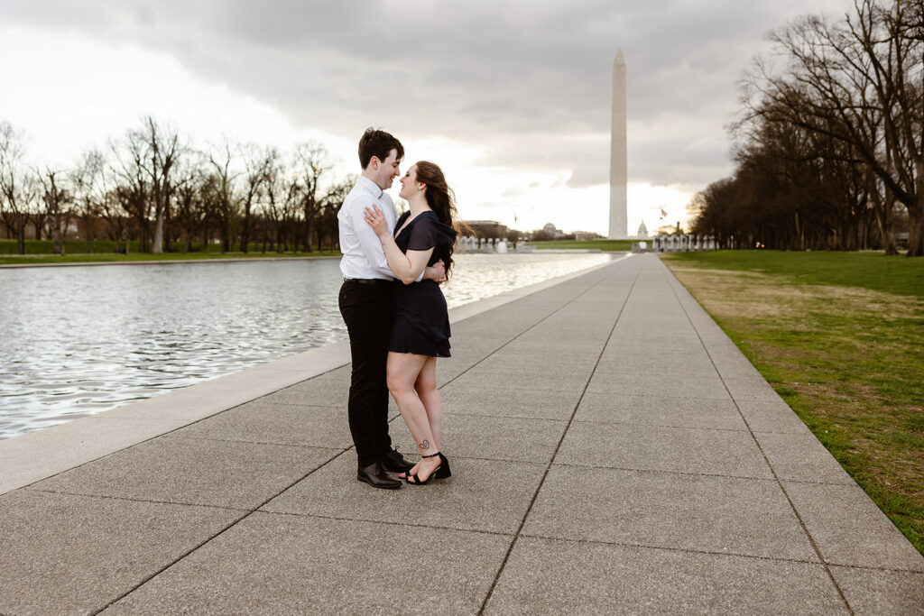 the engaged couple at the reflecting pool for DC engagement photos