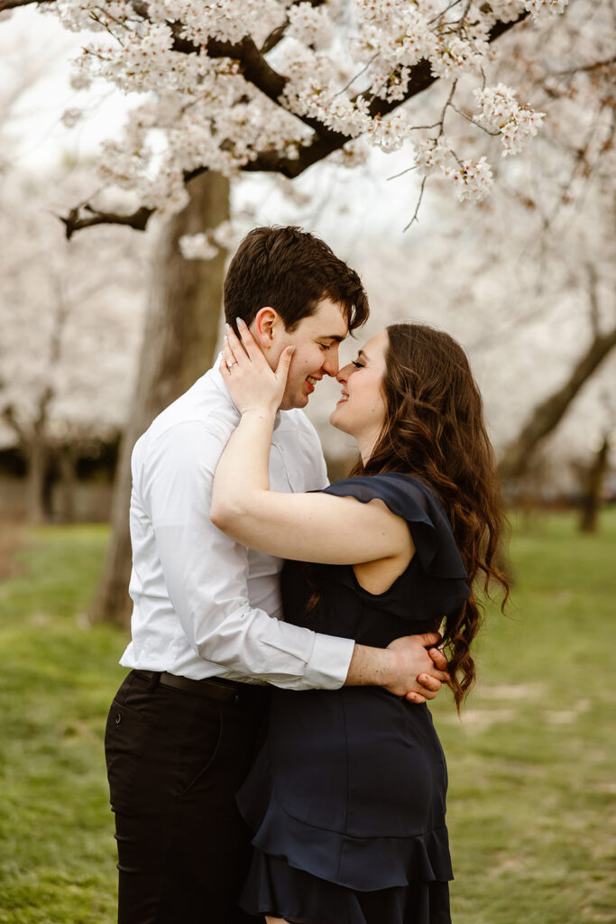 the engaged couple in Washington DC during the National Cherry Blossom Festival