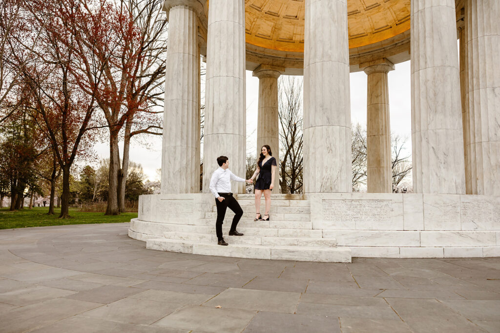 the engaged couple at the DC War Memorial 