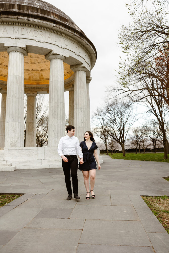 the engaged couple at the DC War Memorial for engagement photos