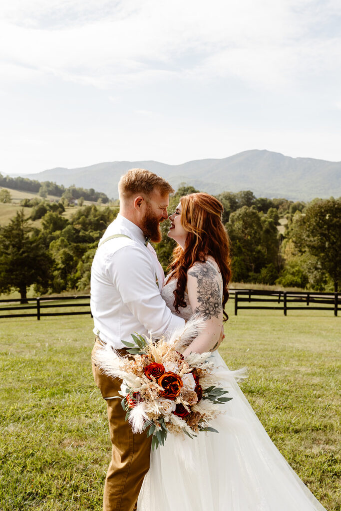 the wedding couple leaning in to kiss during their Shenandoah National Park elopement