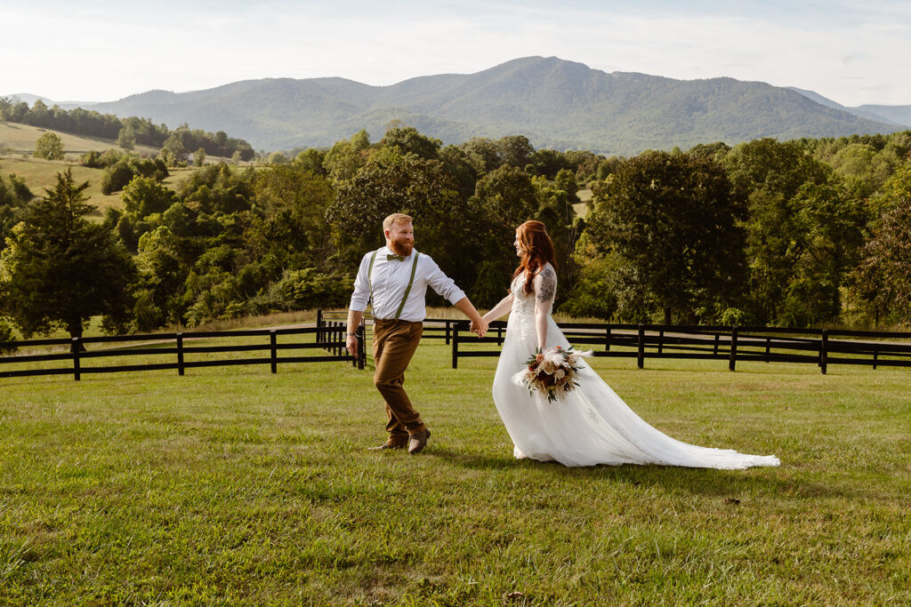 the wedding couple walking together at Shenandoah National Park during their fall elopement