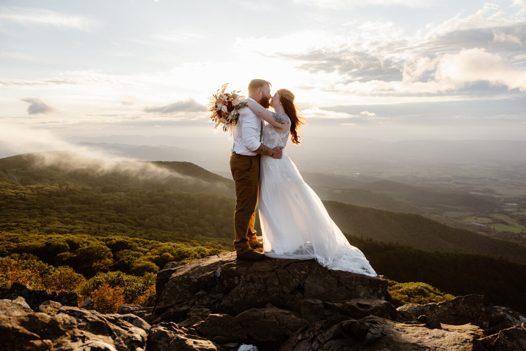 the wedding couple at sunset at Shenandoah National Park in September