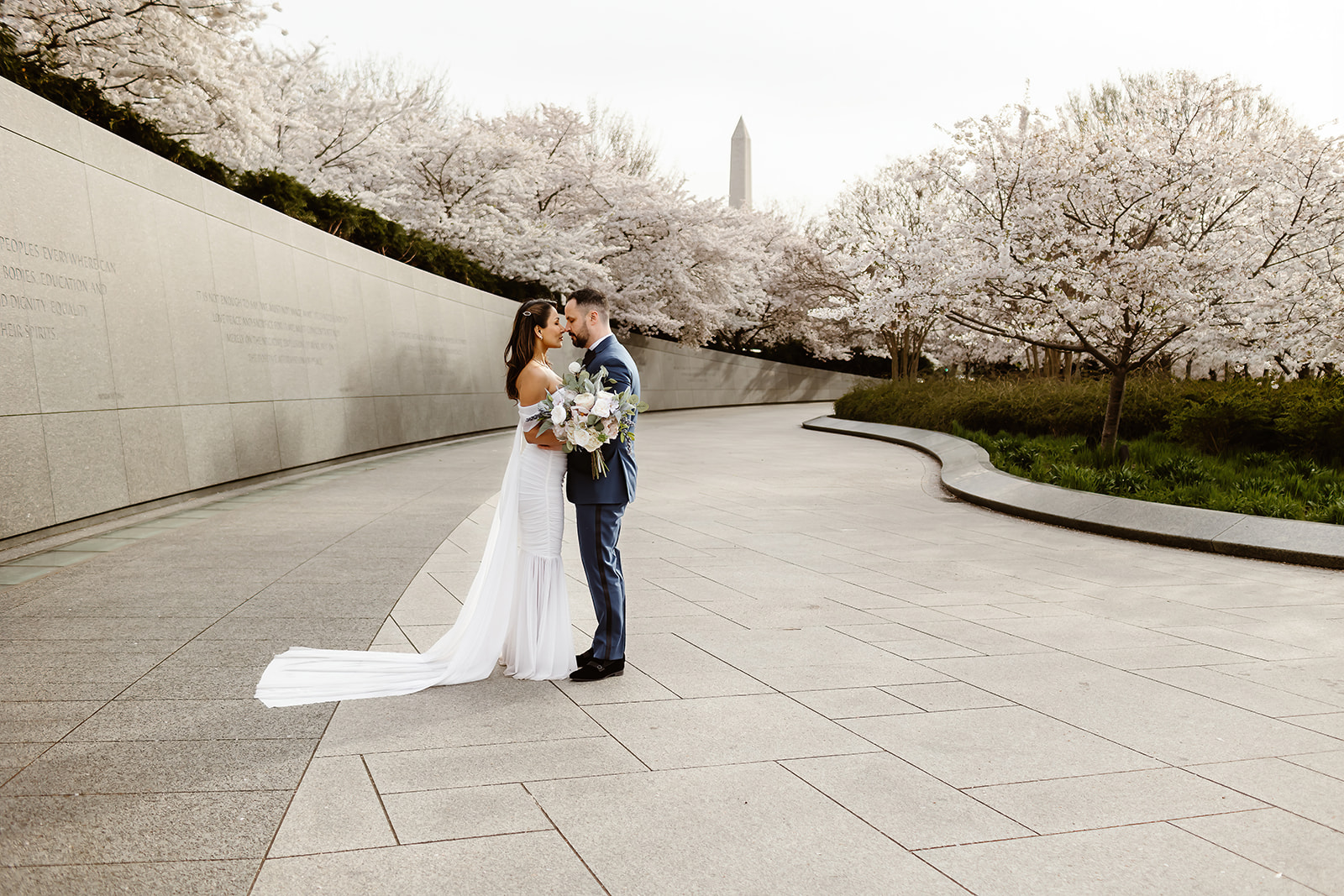the wedding couple kissing at their spring DC elopement