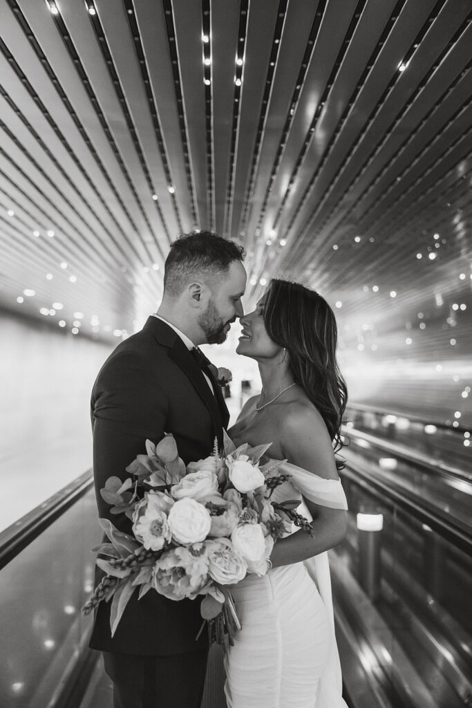 the wedding couple at the National Gallery of Art in the tunnel