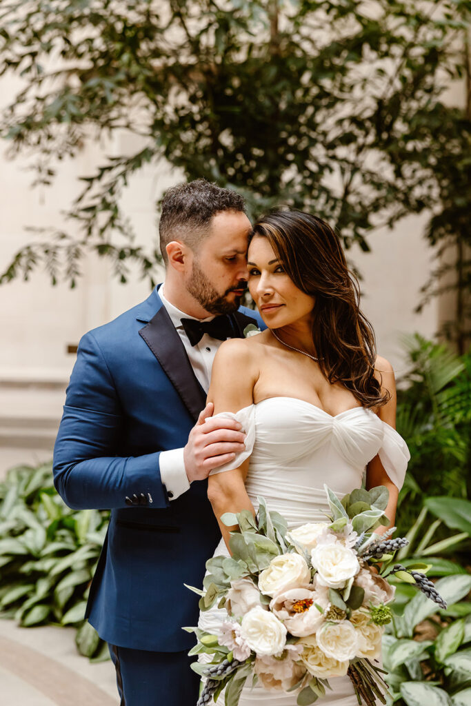 the wedding couple in Washington DC for their elopement photos at the National Gallery of Art