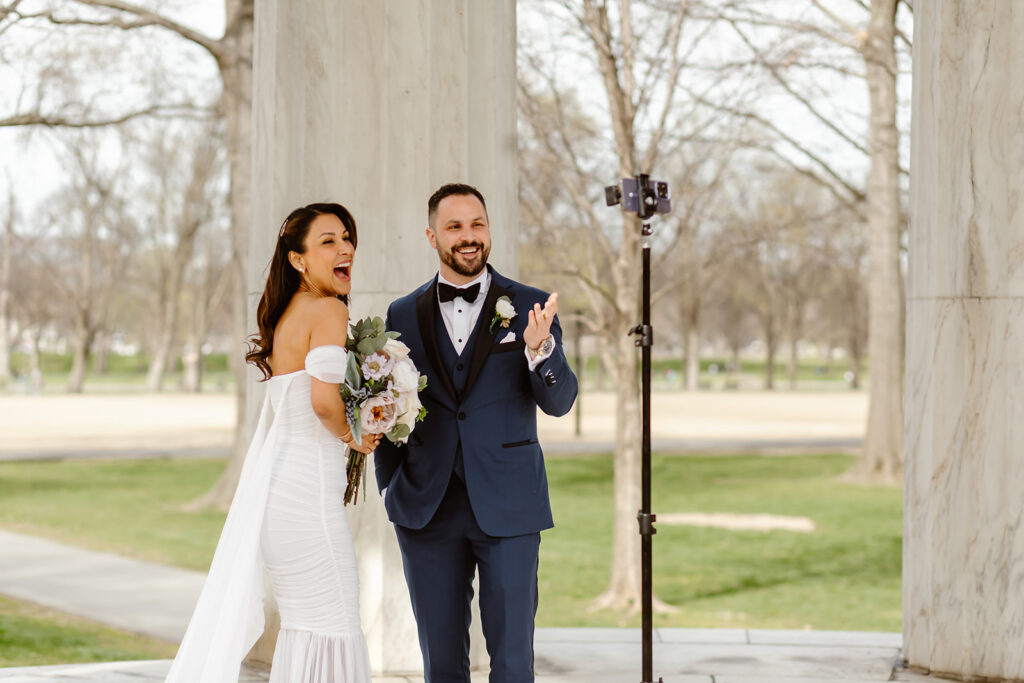 the wedding couple saying hello to the livestream during their elopement ceremony