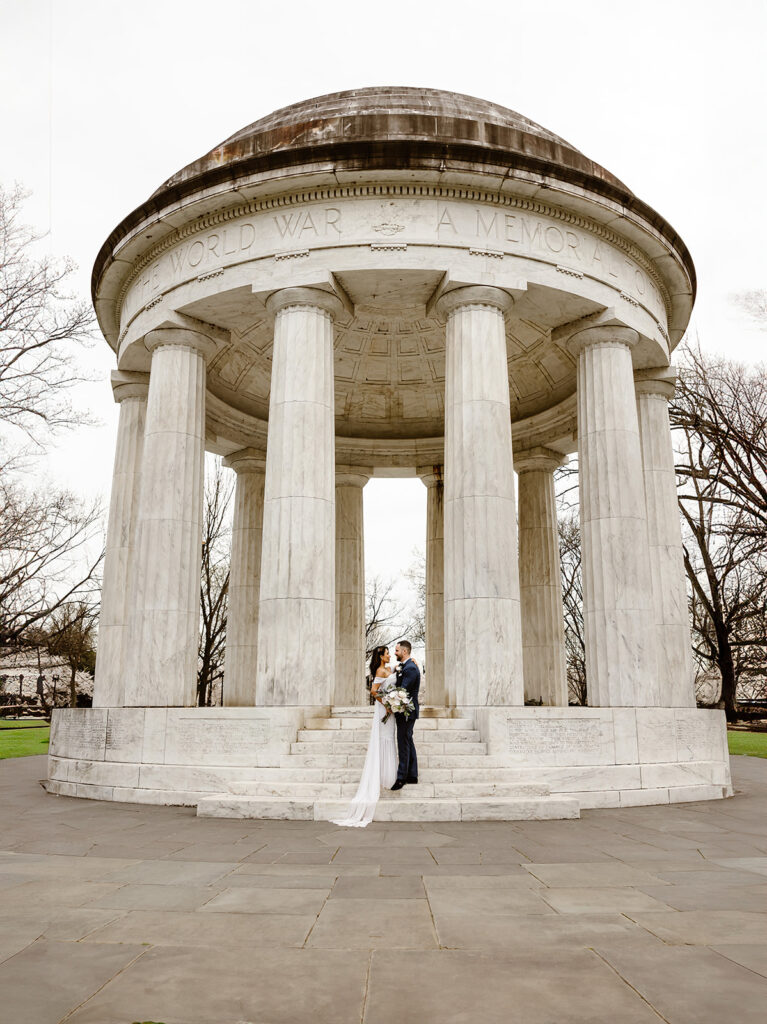 the wedding couple at the DC War Memorial for elopement photos