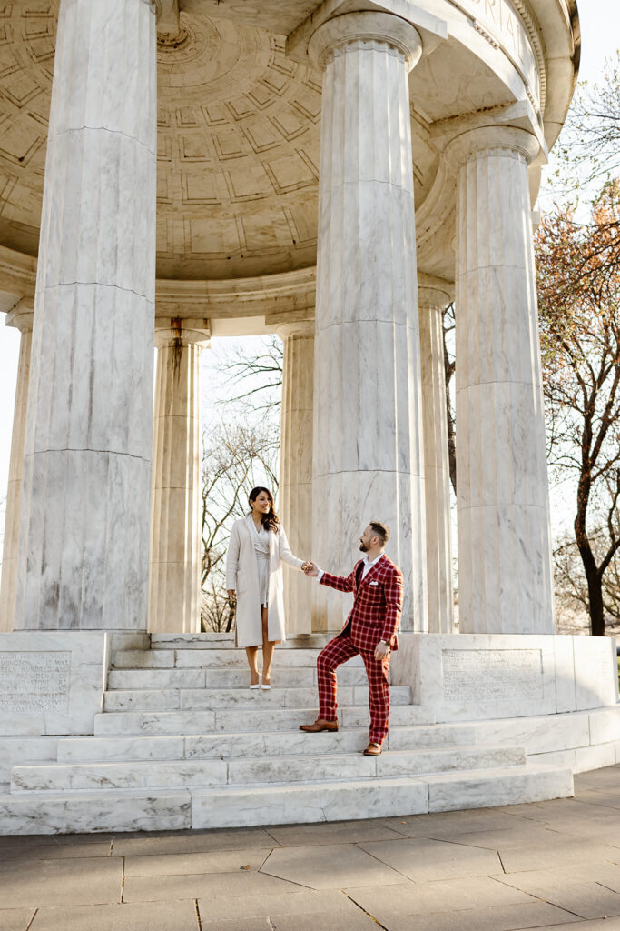 the couple at the DC War Memorial for engagement photos 