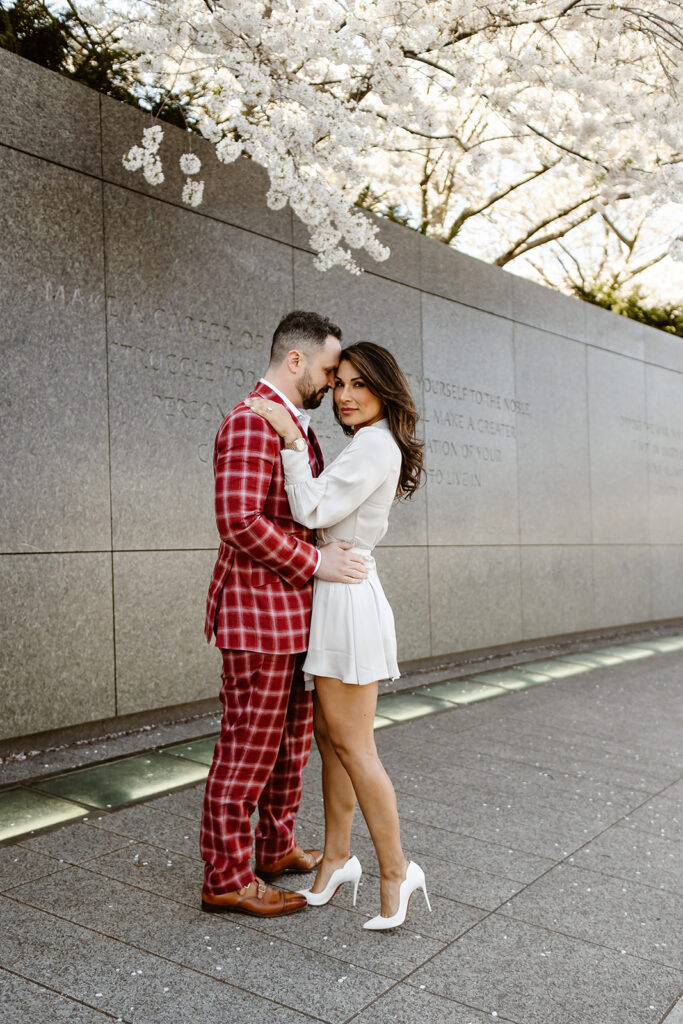 the couple with the cherry blossoms in Washington DC