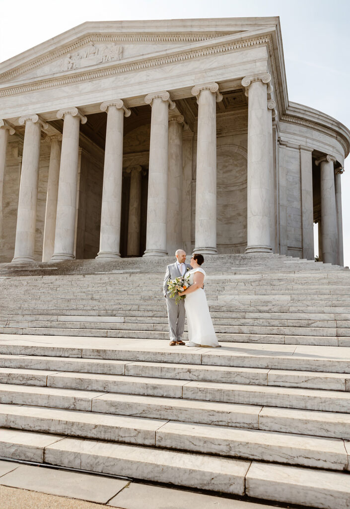 the DC elopement couple visiting the Lincoln Memorial