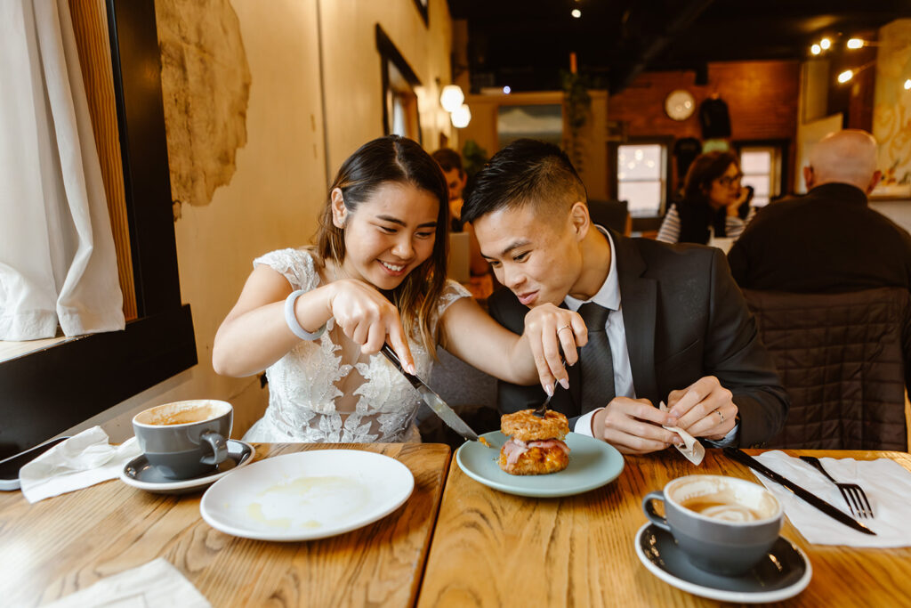 the wedding couple enjoying their lattes and food after their elopement ceremony