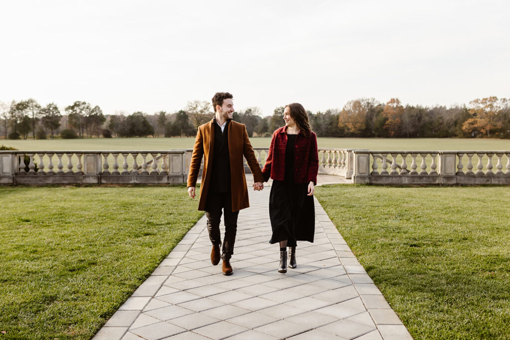 the engaged couple walking together at their engagement venue