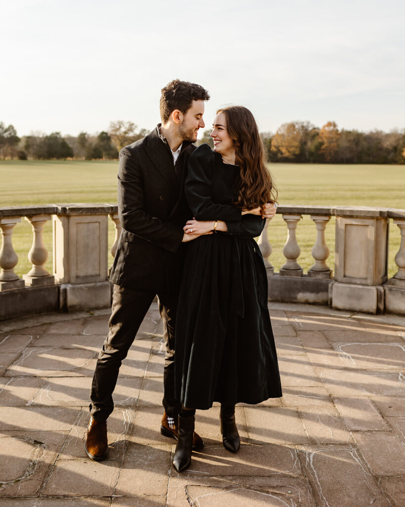 the engaged couple posing during their couples photoshoot at the Great Marsh Estate